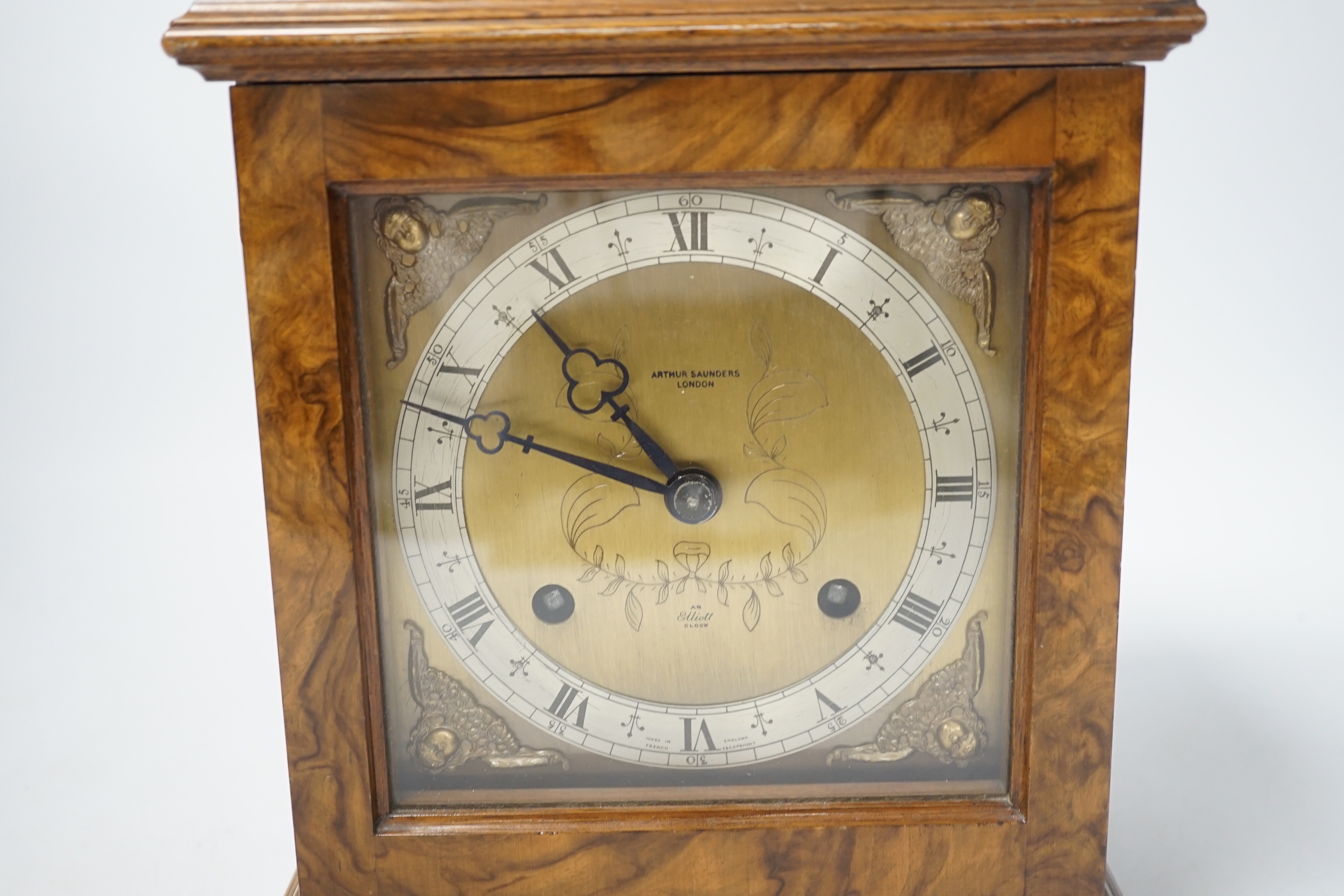 An Elliott mantel clock, the dial inscribed Arthur Saunders, London, 31cm high